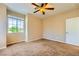 Neutral bedroom featuring carpet, natural light and ceiling fan at 1178 Yellow Orchid St, Henderson, NV 89002