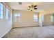 Spacious bedroom with carpet, natural light and a ceiling fan at 1178 Yellow Orchid St, Henderson, NV 89002