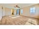 Spacious bedroom with carpet, a ceiling fan, and lots of natural light at 1178 Yellow Orchid St, Henderson, NV 89002