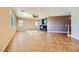 Spacious living room featuring large windows, tile flooring, and a ceiling fan at 1178 Yellow Orchid St, Henderson, NV 89002