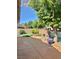 Backyard featuring a covered patio and well-manicured landscaping at 1461 Harmony Hill Dr, Henderson, NV 89014