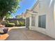 Outdoor patio features a block fence and green landscaping at 1461 Harmony Hill Dr, Henderson, NV 89014