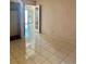 Bright bedroom with tile flooring and sliding glass door access at 1461 Harmony Hill Dr, Henderson, NV 89014