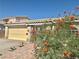 Close up of home featuring desert landscaping and a front gate at 1461 Harmony Hill Dr, Henderson, NV 89014