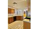 Well-equipped kitchen with stainless steel appliances, ample counter space, and bright lighting at 1461 Harmony Hill Dr, Henderson, NV 89014