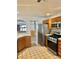 Functional kitchen with stainless steel appliances and light wood cabinets at 1461 Harmony Hill Dr, Henderson, NV 89014