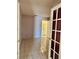 Office space with tiled flooring and white paneled doors at 1461 Harmony Hill Dr, Henderson, NV 89014
