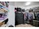Walk in closet with built in shelving and drawers for optimal storage and organization at 1708 Anzio St, Las Vegas, NV 89108