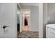 Hallway view showing access to a bathroom with a blue shower curtain at 1708 Anzio St, Las Vegas, NV 89108