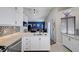 Bright kitchen featuring stainless steel appliances, white countertops, and adjacent dining area at 1708 Anzio St, Las Vegas, NV 89108
