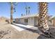 Backyard with mature trees and sliding glass door access at 2005 Jansen Ave, Las Vegas, NV 89101