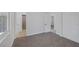 Bedroom with neutral carpet and access to bathroom and closet at 2005 Jansen Ave, Las Vegas, NV 89101