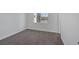 Bedroom features neutral walls, carpet, and a bright window at 2005 Jansen Ave, Las Vegas, NV 89101