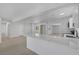 Open-concept living and kitchen area with modern finishes and lots of natural light at 2005 Jansen Ave, Las Vegas, NV 89101