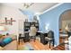 Cozy home office space with built-in shelves and a comfortable seating area and great natural light at 262 Cielito Lindo St, Henderson, NV 89012
