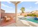 Backyard pool area with lounge chairs, desert landscaping, and blue skies at 262 Cielito Lindo St, Henderson, NV 89012