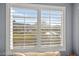 Bright window with shutters offering views of the green outdoor scenery at 262 Cielito Lindo St, Henderson, NV 89012