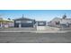 Modest single-story home with a gated front yard providing security and curb appeal at 2721 Merritt Ave, Las Vegas, NV 89102