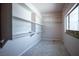 Storage room or pantry area with built-in shelving units and a window at 2721 Merritt Ave, Las Vegas, NV 89102