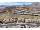 An aerial view of a neighborhood featuring sidewalks and desert landscaping at 2931 Raywood Ash Dr, Las Vegas, NV 89138