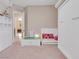 Bedroom with pink carpet, built-in bed, shelving and toys at 2931 Raywood Ash Dr, Las Vegas, NV 89138
