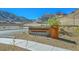 Entrance to Reverence Park with a stone sign and scenic mountain views at 2931 Raywood Ash Dr, Las Vegas, NV 89138