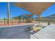 Community playground with sunshades, picnic benches, and play structures at 2931 Raywood Ash Dr, Las Vegas, NV 89138