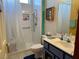Bathroom featuring a shower with curtain, navy vanity, and tile flooring at 3028 Ripon Dr, Las Vegas, NV 89134