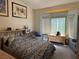 Bedroom with bay window, carpet flooring, and neutral wall color at 3028 Ripon Dr, Las Vegas, NV 89134