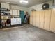Spacious garage with washer, dryer, and ample storage cabinets at 3028 Ripon Dr, Las Vegas, NV 89134
