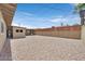 Spacious backyard features stone landscaping, privacy walls, and a built-in outdoor grilling area at 3101 Greenbriar Dr, Las Vegas, NV 89121