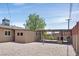 Spacious backyard features stone landscaping, privacy walls, and a built-in outdoor grilling area at 3101 Greenbriar Dr, Las Vegas, NV 89121