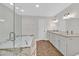 Beautiful bathroom features a soaking tub with marble finishing and dual vanity sinks at 3101 Greenbriar Dr, Las Vegas, NV 89121