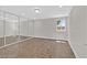 Spacious bedroom that includes an expansive closet with full mirrored sliding doors at 3101 Greenbriar Dr, Las Vegas, NV 89121