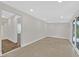 Bonus room featuring tile floors, sliding glass door to covered patio and ample open space at 3101 Greenbriar Dr, Las Vegas, NV 89121