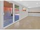 Bonus room featuring sliding glass door to covered patio and a small kitchenette area at 3101 Greenbriar Dr, Las Vegas, NV 89121