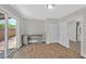 Flex space includes a built-in desk, backyard view, and wood look flooring at 3101 Greenbriar Dr, Las Vegas, NV 89121