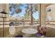 Outdoor balcony with seating area and view of the complex at 3145 E Flamingo Rd # 1045, Las Vegas, NV 89121