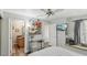 Bedroom featuring mirrored closet, window seat, and modern decor at 3145 E Flamingo Rd # 1045, Las Vegas, NV 89121