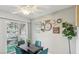 Charming dining area with a table, stylish decor, and sliding door access to a patio at 3145 E Flamingo Rd # 1045, Las Vegas, NV 89121