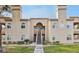 Attractive condo building with well-kept landscaping and visible unit numbers at 3145 E Flamingo Rd # 1045, Las Vegas, NV 89121