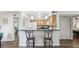 View of the kitchen with modern cabinets, bar seating, and stainless steel appliances at 3145 E Flamingo Rd # 1045, Las Vegas, NV 89121