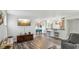 Bright living area open to dining and kitchen areas with modern bar stools and fixtures at 3145 E Flamingo Rd # 1045, Las Vegas, NV 89121