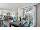 Bright living room featuring dining area with balcony access and comfortable seating, perfect for relaxation at 3145 E Flamingo Rd # 1045, Las Vegas, NV 89121