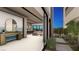 Elegant entryway leading to open floor plan with lake views, featuring a stylish foyer and modern design at 32 Heron Harbour Dr, Henderson, NV 89011