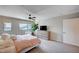 Bedroom featuring natural light, a ceiling fan, and minimalist decor for a calm atmosphere at 3358 Via Strada St, Henderson, NV 89044