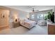 Relaxing bedroom with a cozy chair, soft lighting, and serene decor at 3358 Via Strada St, Henderson, NV 89044
