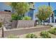 Welcoming 'HIGHVIEW' community sign amidst landscaped greenery and modern home exteriors at 3358 Via Strada St, Henderson, NV 89044