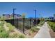 Community pool with lounge chairs and landscaped perimeters provide an inviting space for residents to relax and socialize poolside at 3358 Via Strada St, Henderson, NV 89044
