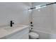 Clean bathroom with white subway tile, modern fixtures, and a combination tub and shower at 383 N 16Th St, Las Vegas, NV 89101